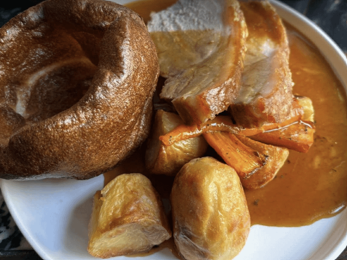 Best Sunday Roast in London Prince of Shoreditch Roast Pork, Yorkshire Pudding and Roasted potatoes